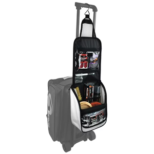 Genesis® Sport™ Accessory Bag hanging from a Roller Bag Handle